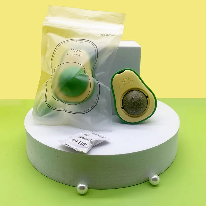 Draaiende catnipbal in kunststof avocadohouder, perfect voor katten om te likken

